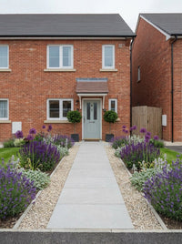 Showcase · Symmetrical front garden with bay standards at the door and purple and silver planting either side of the path