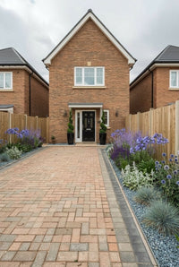 Showcase · Front elevation with slim spirals at the door and a blue and silver border along the driveway